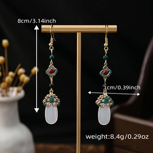 Detail view of vintage Chinese style tassel earrings showing 8cm length and size measurement