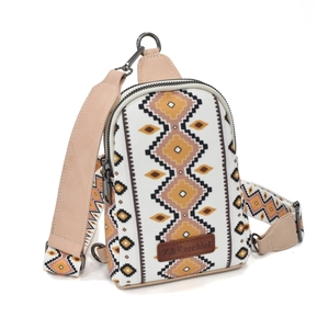 Detail of bohemian canvas chest bag with geometric pattern and brown leather patch