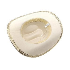 Detail view of white cowboy hat interior with sequin brim, polyester lining and sweatband
