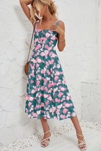 Detail of floral summer dress with drawstring neckline and lightweight chiffon fabric