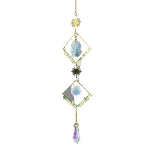 Golden moon suncatcher with blue raw stones, faceted crystals and a rainbow prism pendant