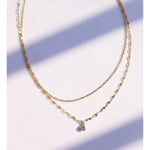 Double-layered 18K gold-plated titanium steel necklace with a sparkling round zircon pendant