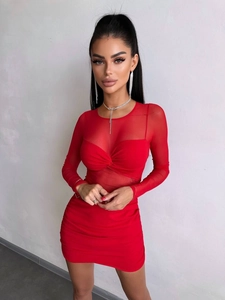 Detail of red ruched mesh mini dress showing front twist design and slim fit texture