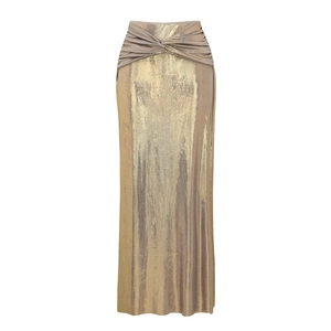 Detail showing high waist knot and metallic pleated texture of the golden maxi skirt