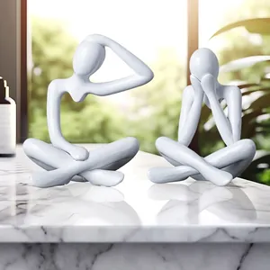 Minimalist white abstract thinker sculpture set for modern home decor on marble surface