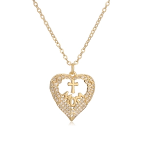 Detailed close-up of a gold-plated heart pendant with MOM lettering and cross detail