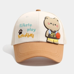 Detail of cartoon bear patch and basketball embroidery on kids mesh trucker cap