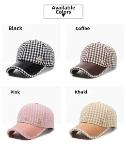 Houndstooth baseball caps set in black, coffee, pink, and khaki with leather brim detail