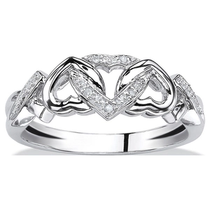 Detailed macro view of triple interlocking heart ring with sparkling zircon pavé