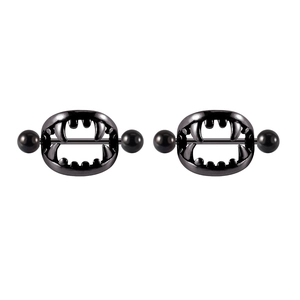 Pair of black stainless steel vampire fang nipple shields with glossy finish on white background