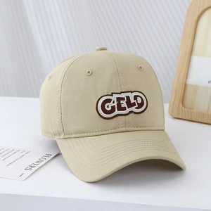 Detail of khaki cotton baseball cap with CELD letter embroidery in a lifestyle setting