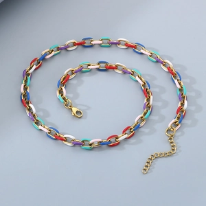 Macro shot of colorful enamel Cuban chain necklace with stainless steel lobster clasp