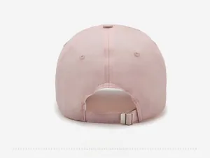 Detailed back view of pink baseball cap with adjustable metal buckle and breathable fabric