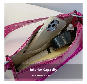 Internal capacity of metallic pink shoulder bag showing phone and cosmetics
