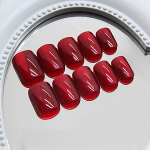 Short square berry red cat eye press-on nails with glossy 3D magnetic jelly finish