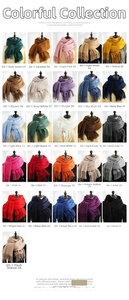 Grid display of solid cashmere-feel scarves in 26 vibrant colors with tassels
