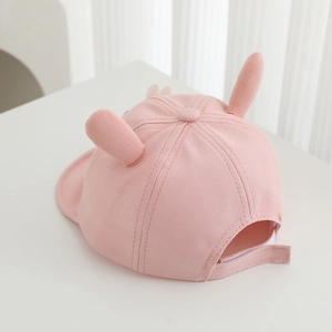 Detailed back view of pink toddler bunny ear cap showing adjustable velcro strap
