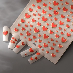 Stereoscopic red heart nail art stickers with gold foil edges and studs, model Co-329