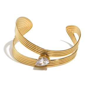 Bracelet jonc en acier plaqué or 18K à rayures avec une grande pierre de zircon goutte