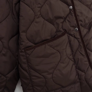 Dark brown quilted jacket with corduroy collar and diamond pattern texture for women