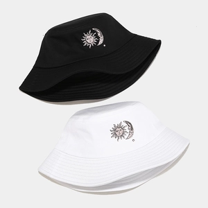 Classic black and white bucket hats with celestial sun and moon embroidery detail