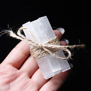 Natural selenite crystal wands tied with hemp rope for healing and home decor