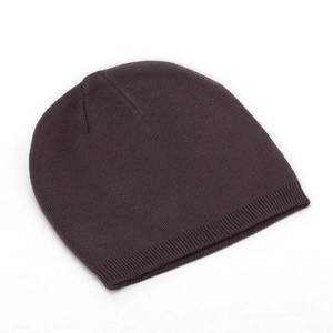 Close-up of dark brown ribbed knit beanie hat showing detailed stitching and texture