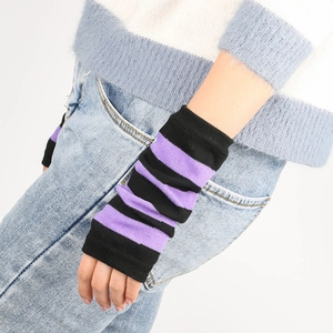 Detail shot of striped purple and black knitted arm sleeves on model with soft focus