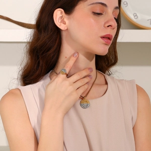 Two-tone 18K gold plated stainless steel necklace and ring set with relief texture