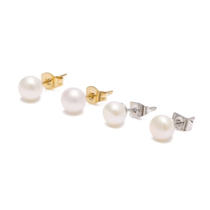 Elegant gold and silver pearl stud earrings set against a minimalist white background