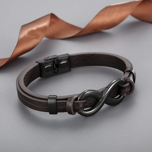 Detail view of brown leather weave bracelet with black infinity stainless steel buckle