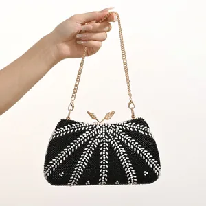 Elegant beaded embroidery evening clutch bag with floral patterns and golden chain strap