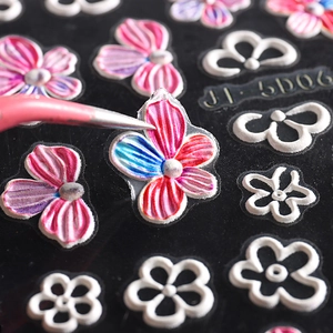 5D embossed floral nail art stickers featuring 3D camellia designs in pink and blue