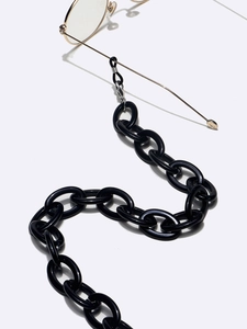 Chunky black acrylic oval link eyewear chain with gold clips for masks or glasses