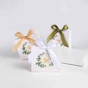 Minimalist eucalyptus gift boxes with Thank You print and satin ribbons in three colors