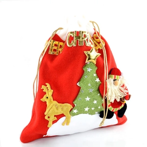 Christmas gift bag with Santa, reindeer and tree embroidery on red velvet fabric