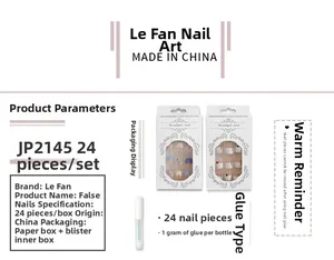 Short French press-on nails set JP2145 with blue wavy design and adhesive glue