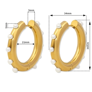 Detailed dimensions of gold hoop earrings with white pearls, showing size and width