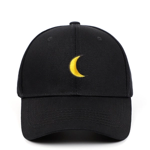 Classic black cotton baseball cap featuring a bright yellow crescent moon embroidery