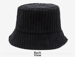 Detail showing the vertical corduroy texture and thick fabric on the back of the black bucket hat