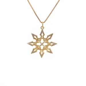 Golden octagonal star pendant necklace with crystal zircons on white background