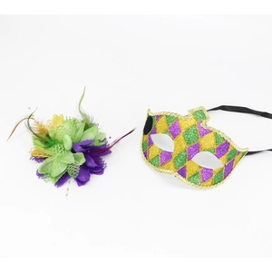Detail of Mardi Gras mask set with purple green gold feathers and diamond glitter pattern