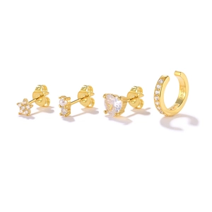 Detail of 4-piece gold S925 silver earring set with star, heart and pearl studs