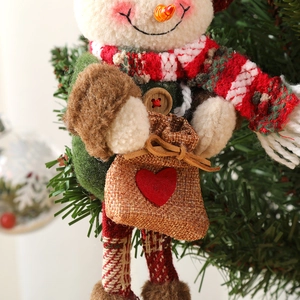 Plush snowman Christmas tree ornament with red plaid scarf and heart burlap bag