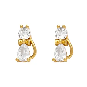 Minimalist gold cat stud earrings featuring teardrop cubic zirconia and bow details