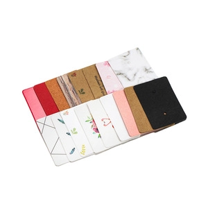 Detailed collection of assorted earring display cards with handmade with love prints