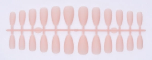 Detail of 24 pieces matte nude pink water drop shape press-on nails on a plastic sprue