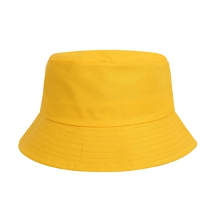Classic bright yellow cotton twill bucket hat for men and women on white background