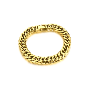 Polished gold curb chain bracelet in stainless steel for men with secure clasp on white background
