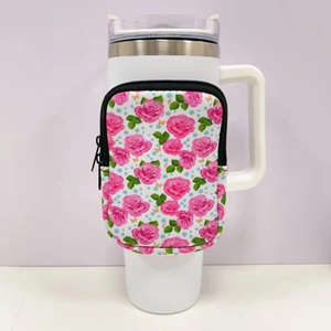 Close-up of neoprene 40oz tumbler sleeve with pink floral print and zipper pouch
